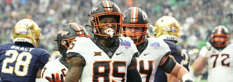 Wisconsin vs. Oklahoma State: 2022 College Football Bowl Game Prop Bets Odds, Picks & Predictions (Tuesday)